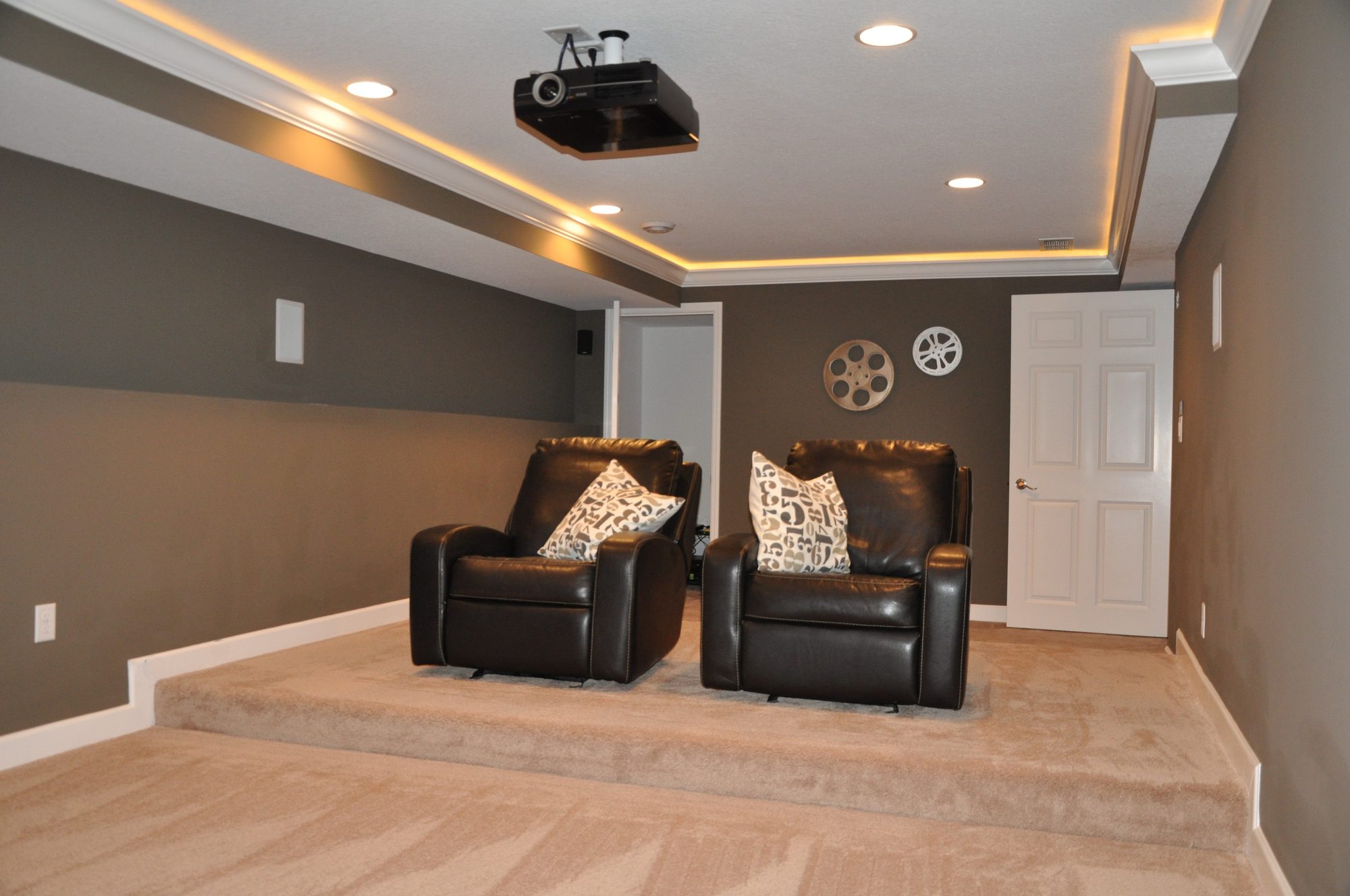 Basement theater room by BN Builders