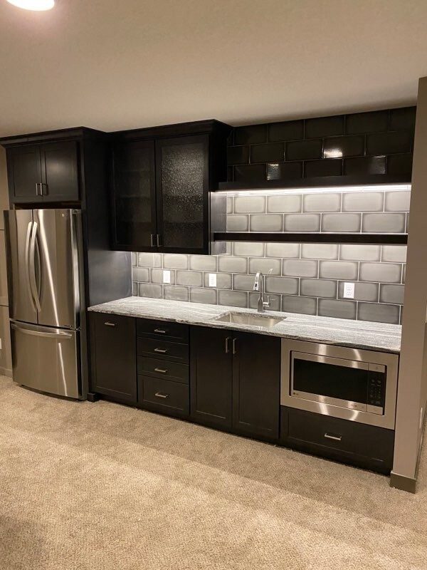 Basement kitchenette in Lakeville, MN by BN Builders